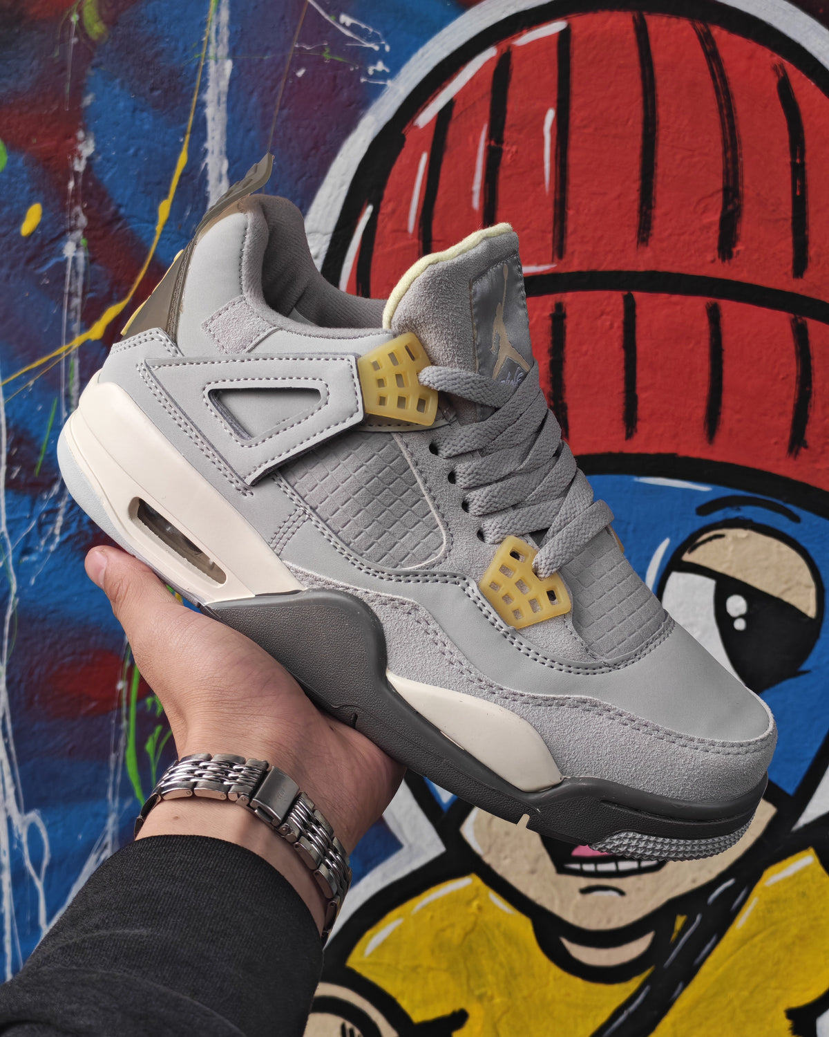 Jordan Retro 4 gris